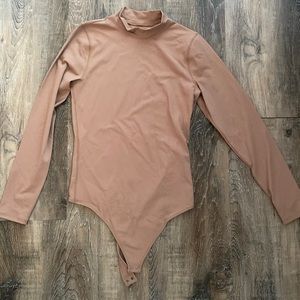 Abercrombie & Fitch Long-Sleeve Seamless Fabric Mockneck Bodysuit nude